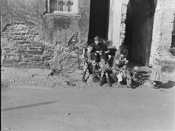 AN OLD STREET WITH INHABITANTS